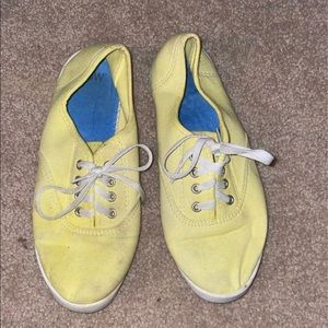 Slip on yellow sneakers